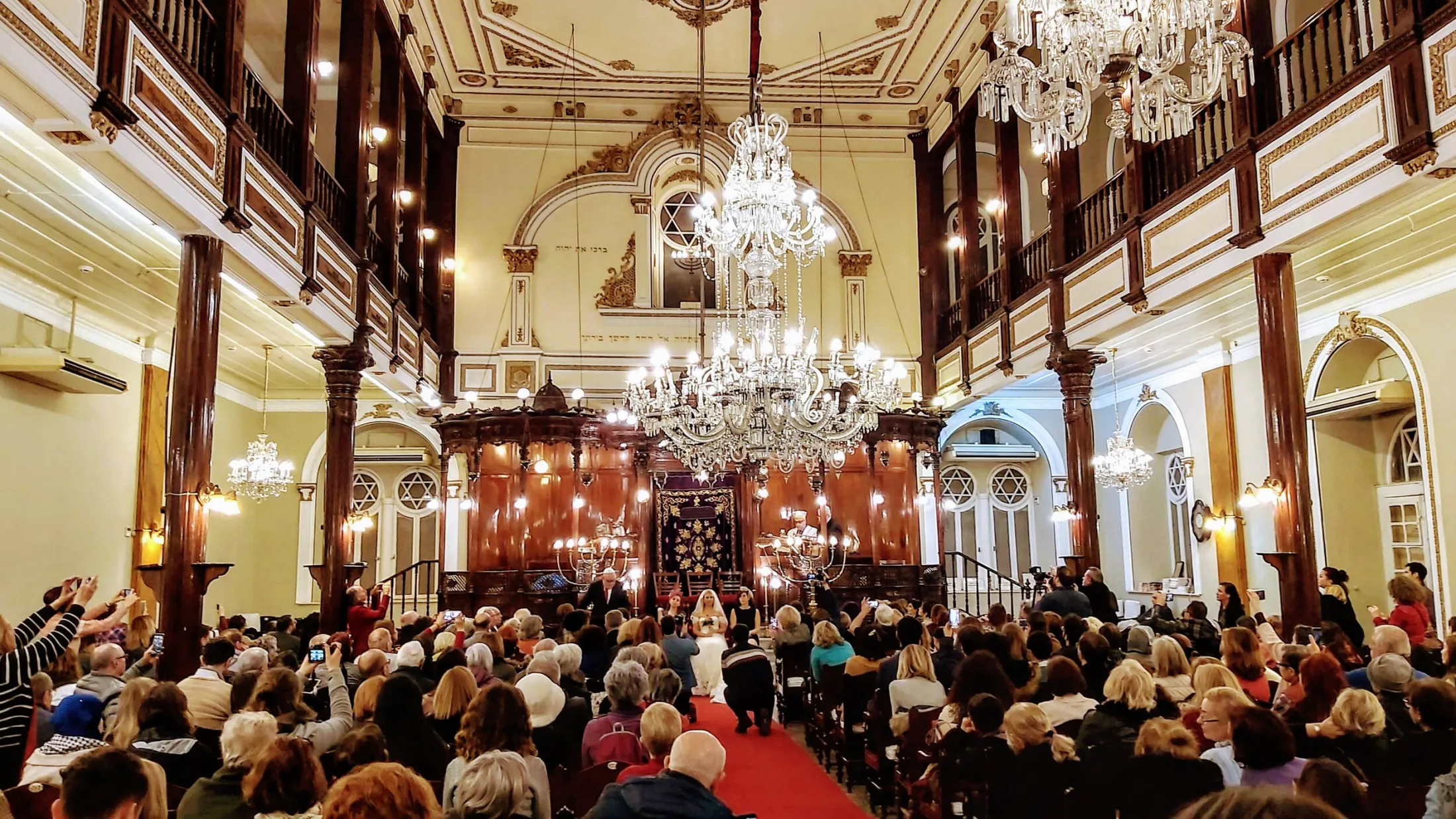 Community gathering inside Bet Israel Synagogue in İzmir.